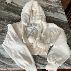 BDG / Urban Outfitters cropped zip up hoodie with fur trim and Pom poms